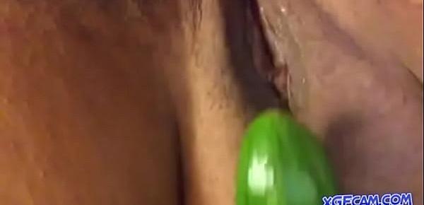  Hot chubby masturbating with cucumber